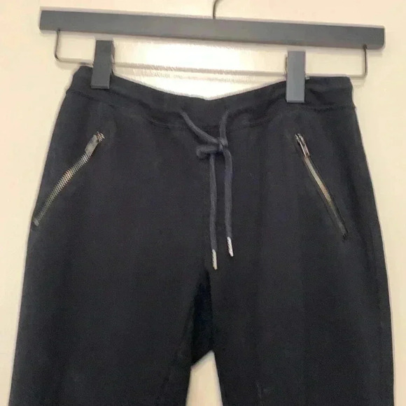 Banana Republic black  sweatpants with zippers at the ankle and a front tie. - Picture 3 of 7